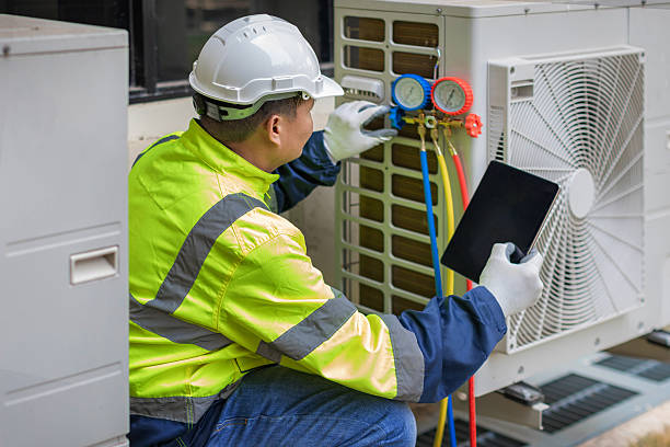 Professional Hvac technician working in Lomira, WI